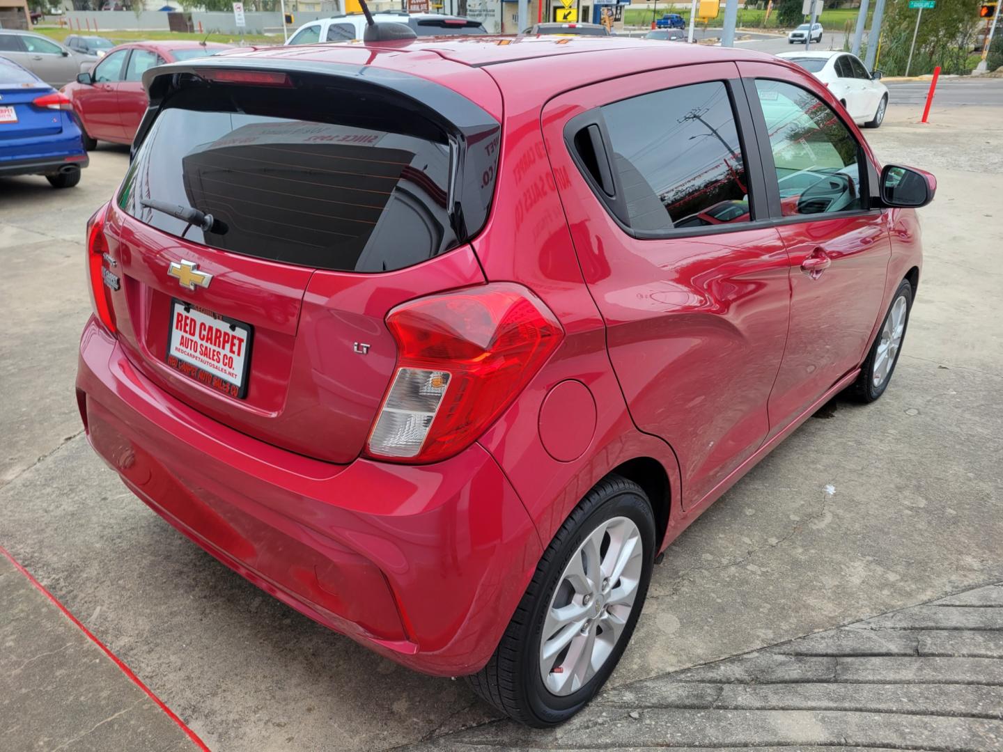 2020 Red Chevrolet Spark 1LT Manual (KL8CC6SA6LC) with an 1.4L L4 16V DOHC engine, 5 Speed Manual transmission, located at 503 West Court, Seguin, TX, 78155, (830) 379-3373, 29.568621, -97.969803 - Photo#2